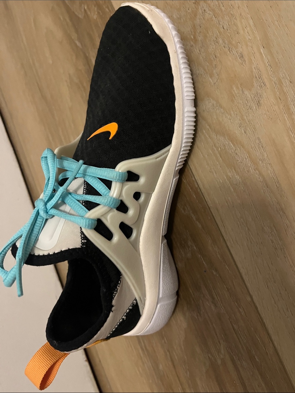 Nikes, baby blue, white-black and orange